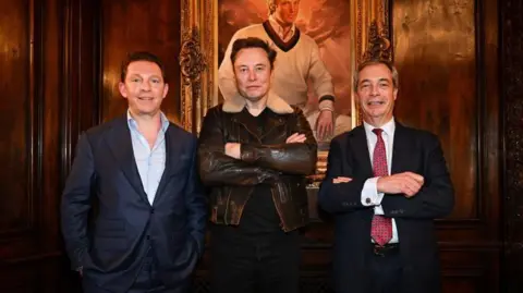 PA Media Nick Candy, Elon Musk and Nigel Farage posing for a photo