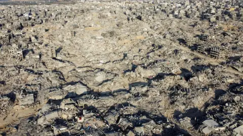 Reuters Screenshot of a drone video showing destroyed buildings in Jabalia, northern Gaza (20 January 2025)