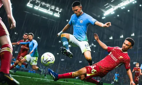 EA Sports A screenshot from EA Sports FC 25 shows a player perform a sliding tackle on a rain-drenched football pitch