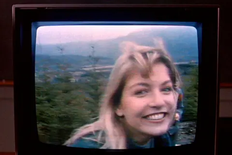 Getty Images Laura Palmer on a TV screen, as played by Sheryl Lee