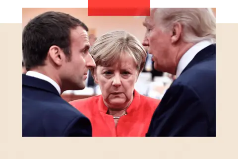 Getty Images A close up of Emmanuel Macron, former German Chancellor Angela Merkel and Donald Trump 