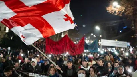 Getty Images Protestors on the streets of Georgian capital Tbilisi