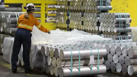 Getty Images A worker at an aluminium plant in Canada