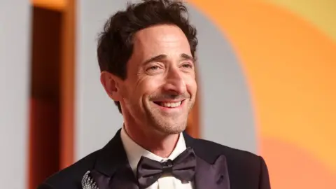 Getty Images Adrien Brody at the 2025 Vanity Fair Oscar Party Hosted By Radhika Jones held at Wallis Annenberg Center for the Performing Arts on March 02, 2025 in Beverly Hills, California