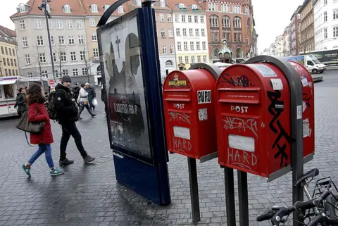 Getty Images Two red post boxes in the centre of Copenhagen