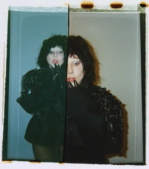 Frank LeBon Lady Gaga poses in a black outfit. The photograph is split into two halves, suggesting the idea of a split personality